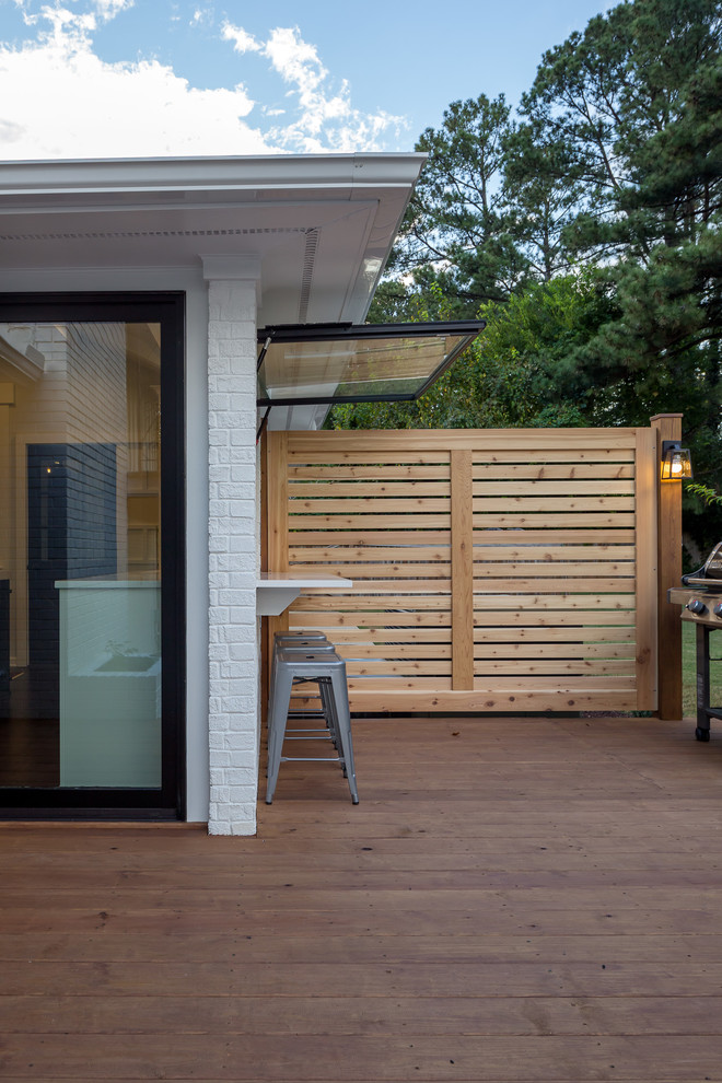 Photo of a transitional backyard patio in Raleigh.