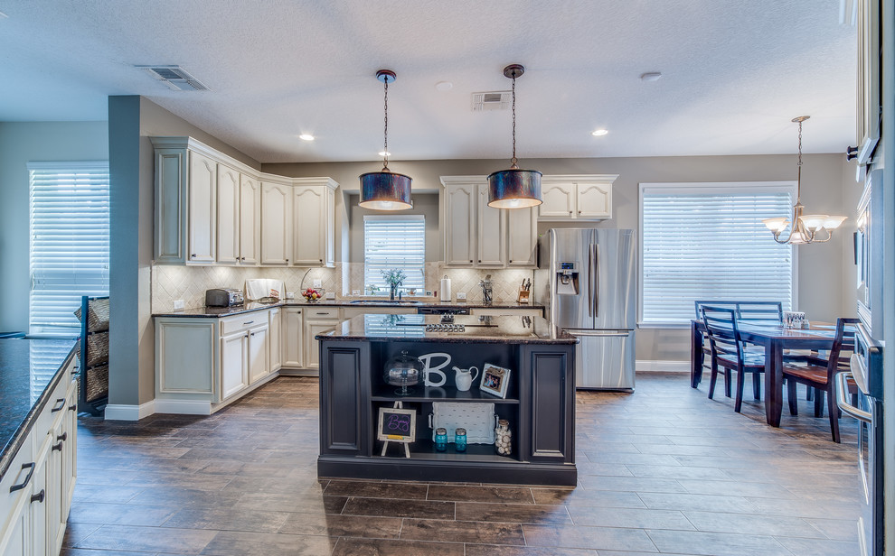 Example of a transitional kitchen design in Orlando