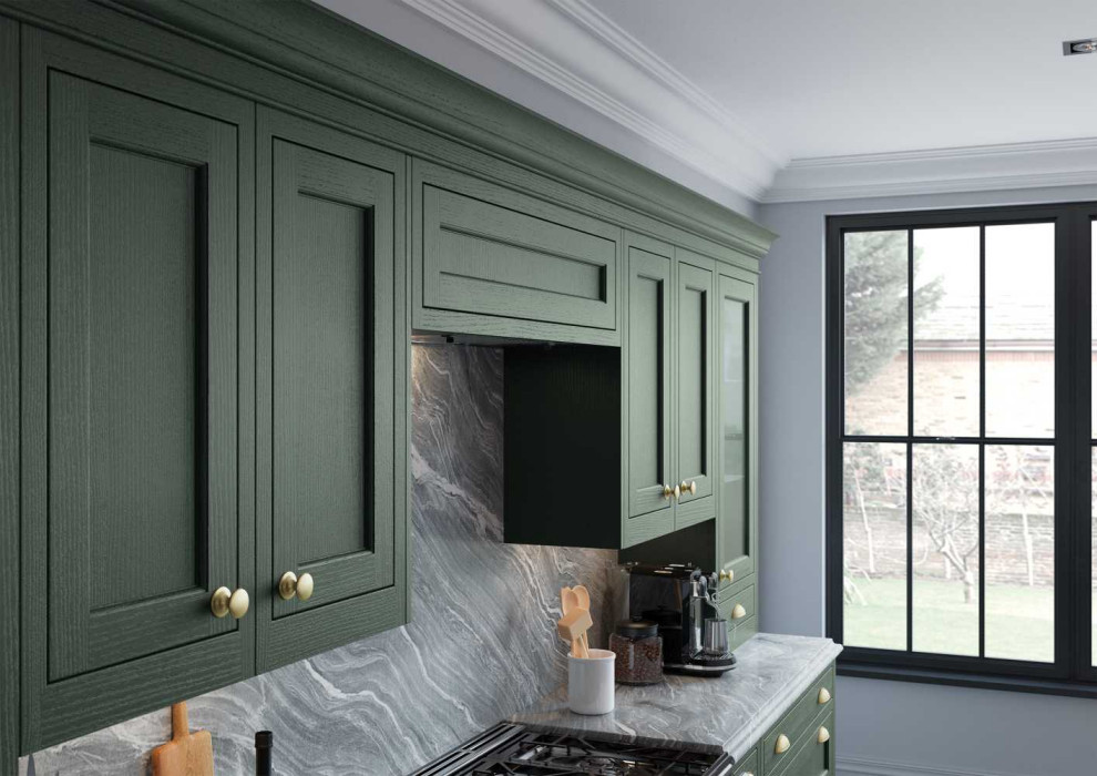 Inspiration for a large traditional galley open plan kitchen in Cheshire with shaker cabinets, green cabinets, marble worktops, grey splashback, marble splashback, grey worktops, a belfast sink, stainless steel appliances, ceramic flooring, an island and grey floors.