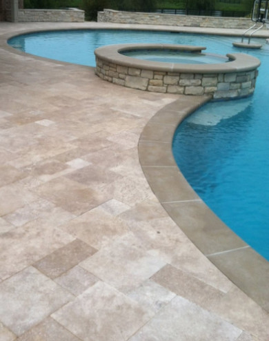 Pool fountain - mid-sized backyard concrete and custom-shaped natural pool fountain idea