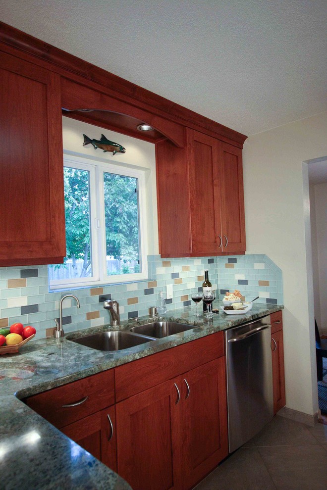 Example of a transitional kitchen design in Seattle