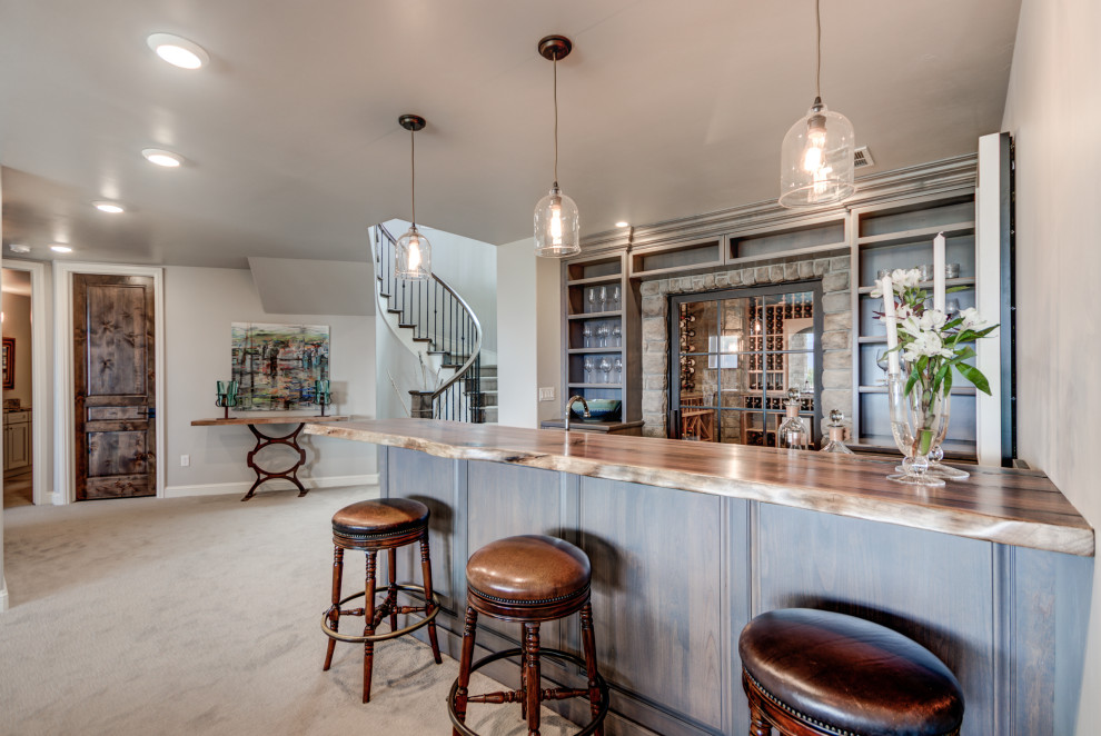 Example of a large transitional home bar design in San Diego