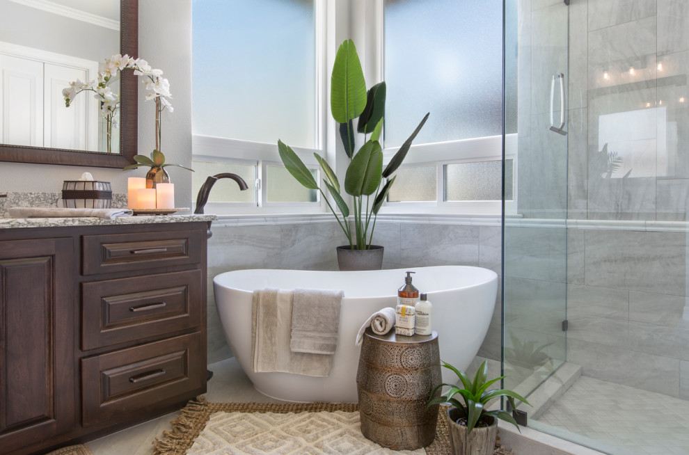 Mid-sized traditional master bathroom in Other with raised-panel cabinets, brown cabinets, quartzite benchtops, a double vanity and a built-in vanity.