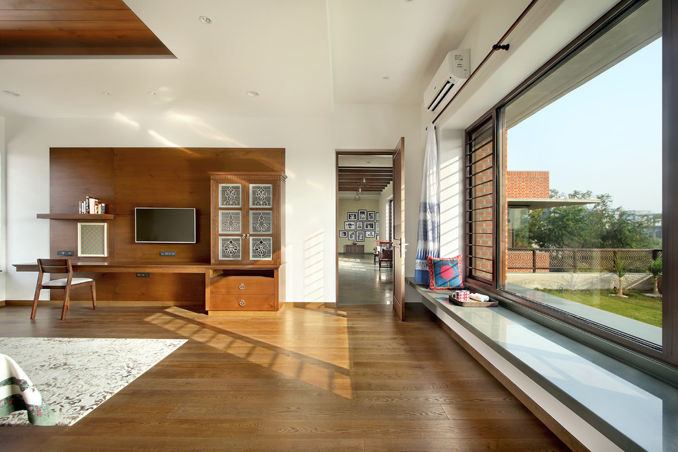 Design ideas for a contemporary bedroom in Ahmedabad.