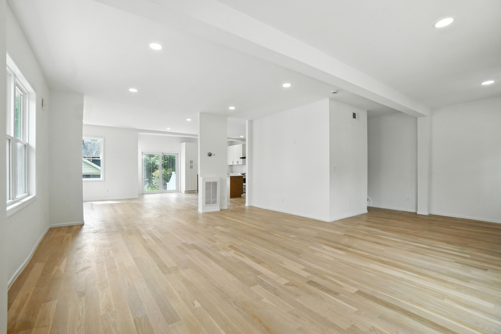 Open-Concept Living Area with Light Hardwood
