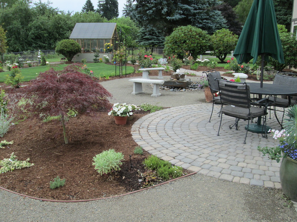 Design ideas for a mid-sized eclectic backyard full sun outdoor sport court for summer in Portland.