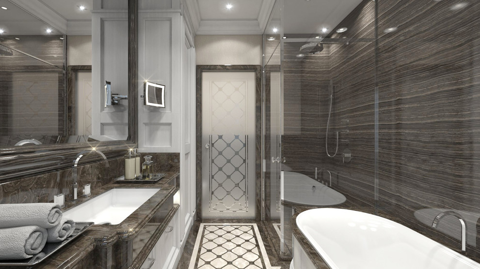 Photo of a large traditional master bathroom in London with a drop-in tub, a corner shower, brown tile, marble, brown walls, marble floors, an undermount sink, marble benchtops, multi-coloured floor and a hinged shower door.