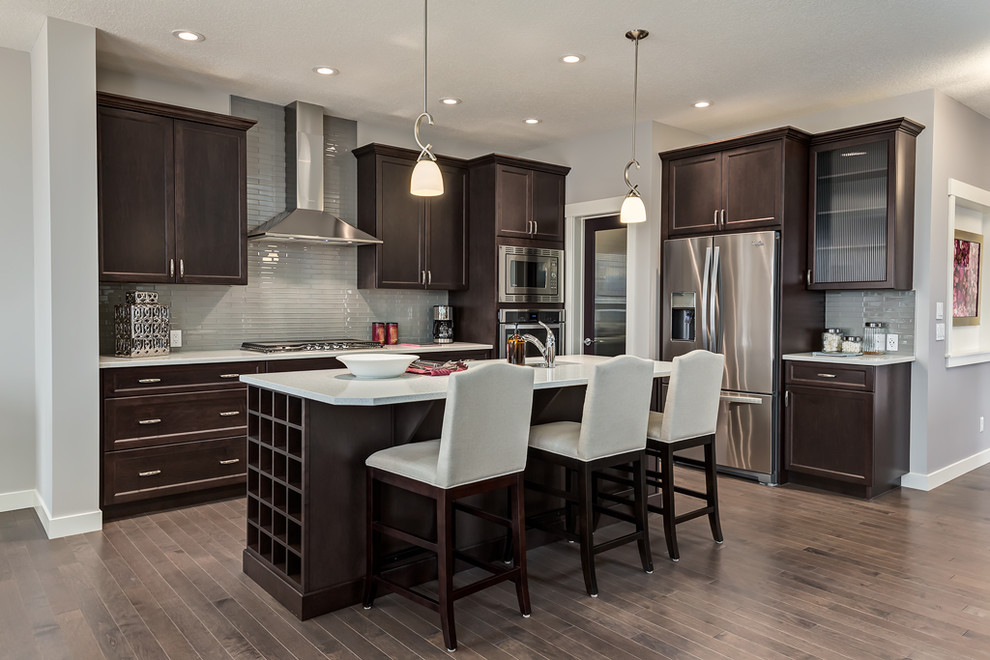 Example of a transitional kitchen design in Calgary