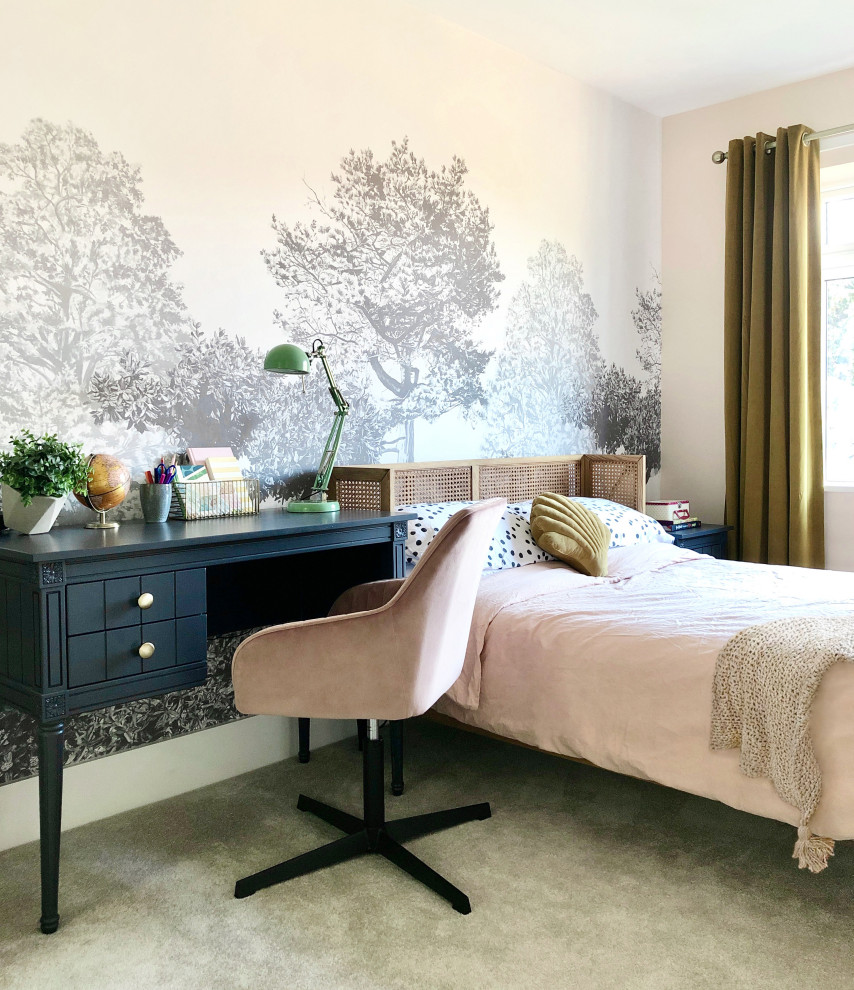This is an example of a contemporary children’s room for girls in Other with pink walls and wallpapered walls.