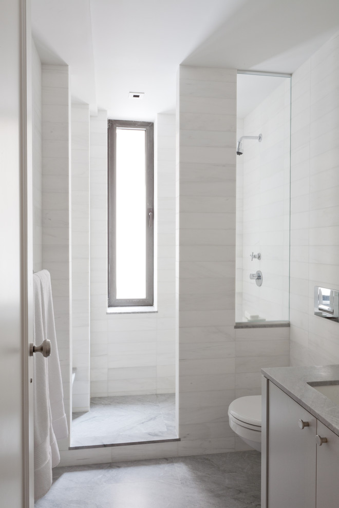 Photo of a contemporary bathroom in New York with an open shower and an open shower.