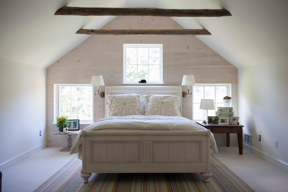 Design ideas for a country bedroom in New York with white walls and carpet.