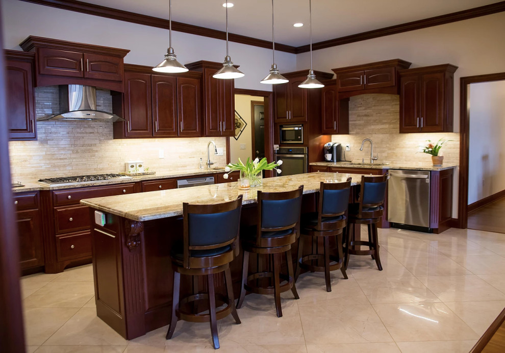 Example of a large minimalist u-shaped porcelain tile and beige floor open concept kitchen design with an undermount sink, raised-panel cabinets, dark wood cabinets, granite countertops, beige backsplash, matchstick tile backsplash, stainless steel appliances, an island and multicolored countertops
