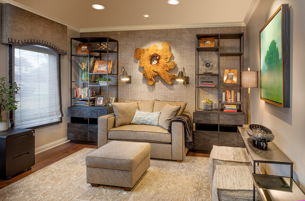Example of a mid-sized transitional freestanding desk dark wood floor, brown floor and wallpaper home office library design in Columbus with green walls