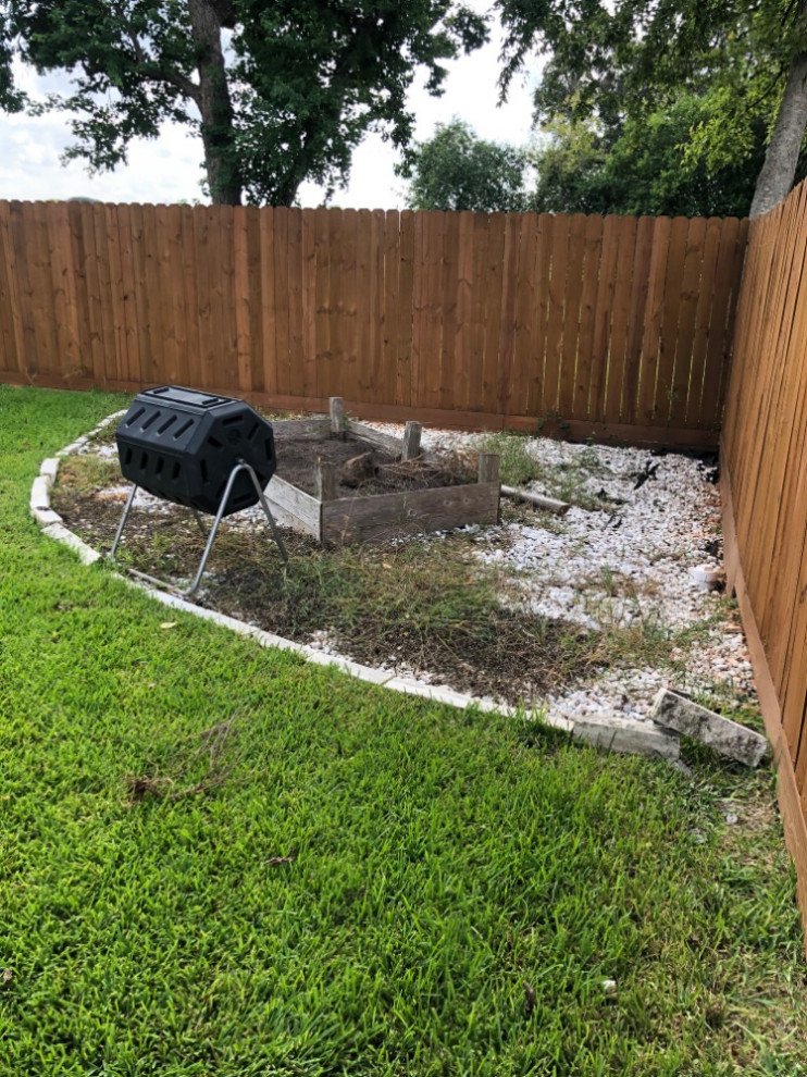 Backyard flagstone walking path with firepit and seating area