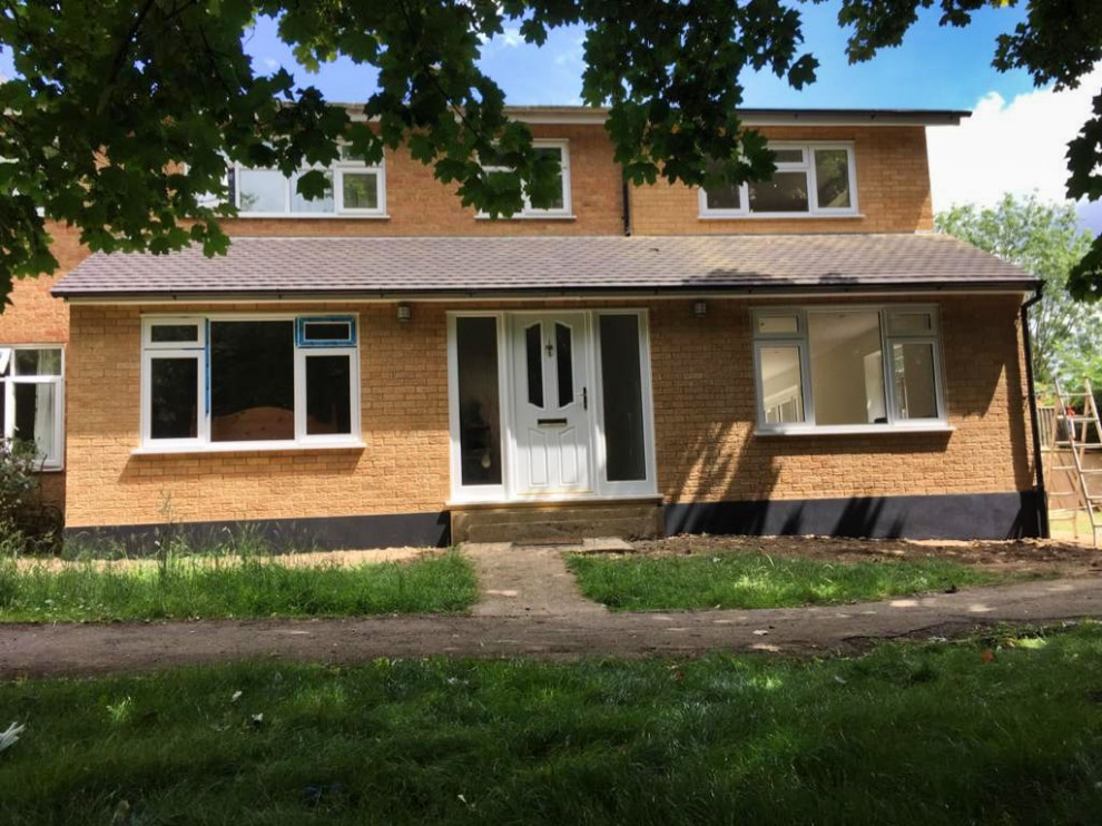 front, side and rear double storey extensions