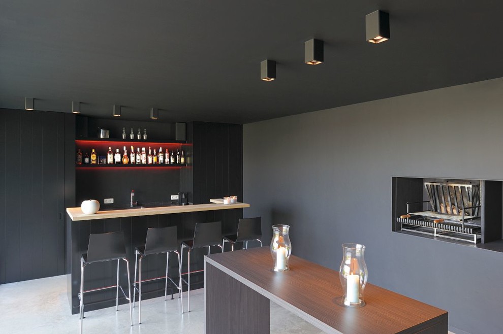 Design ideas for a contemporary home bar in Tampa.