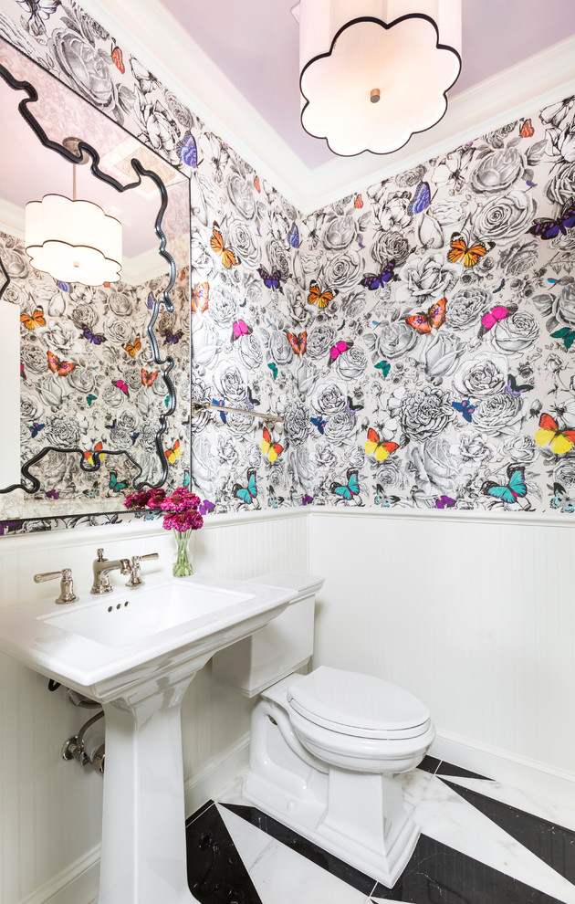 This is an example of a transitional powder room in Houston.