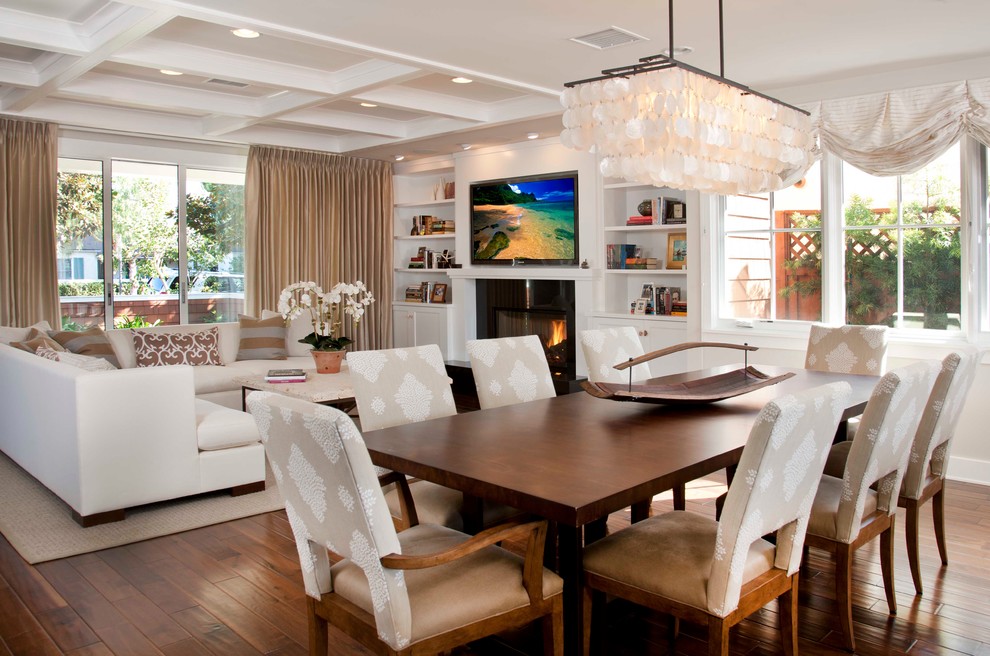 Inspiration for a contemporary dining room in San Diego with white walls and dark hardwood floors.