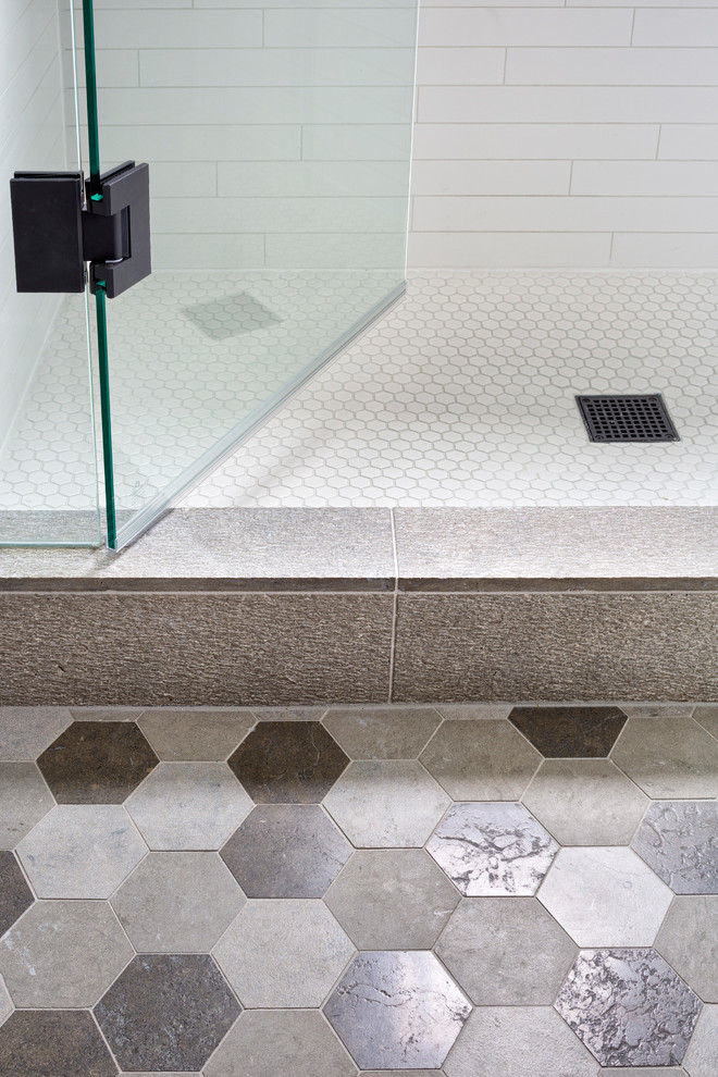 Inspiration for a mid-sized transitional 3/4 white tile and ceramic tile gray floor alcove shower remodel in Denver with recessed-panel cabinets, white cabinets, a two-piece toilet, gray walls, an integrated sink and a hinged shower door