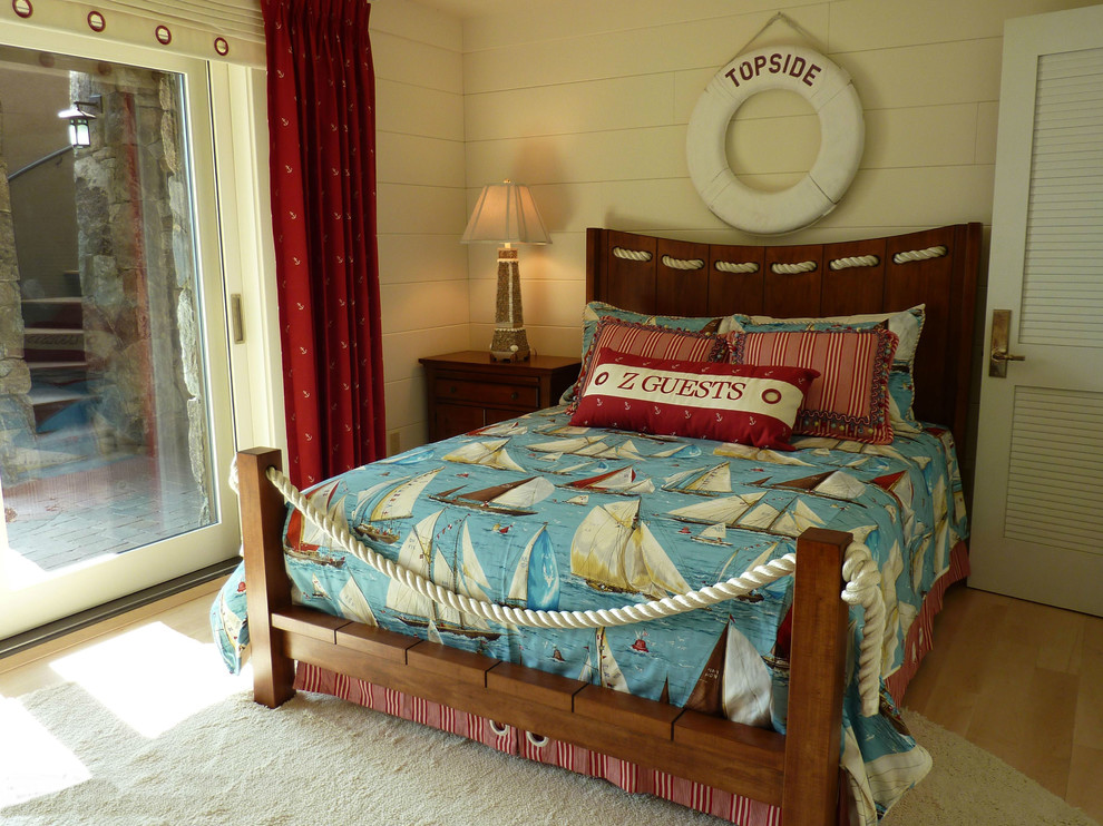 Photo of a beach style bedroom in Milwaukee.