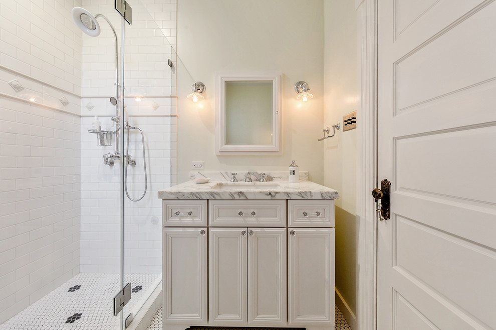 Design ideas for a small traditional 3/4 bathroom in San Francisco with beaded inset cabinets, white cabinets, an alcove shower, white tile, subway tile, white walls, ceramic floors, an undermount sink, quartzite benchtops, white floor and a hinged shower door.