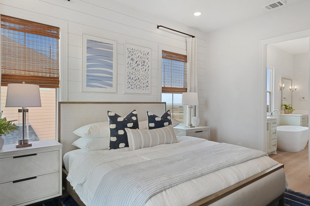 This is an example of a beach style bedroom in Houston.