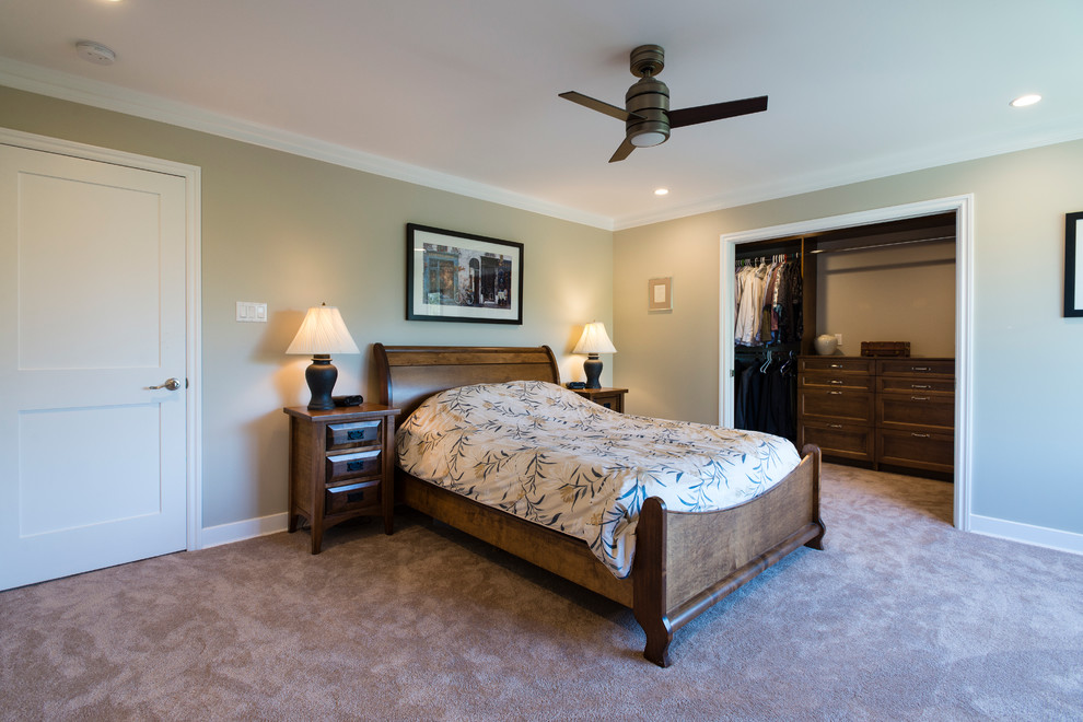 Mid-sized traditional master bedroom in Vancouver with beige walls, carpet, no fireplace and beige floor.
