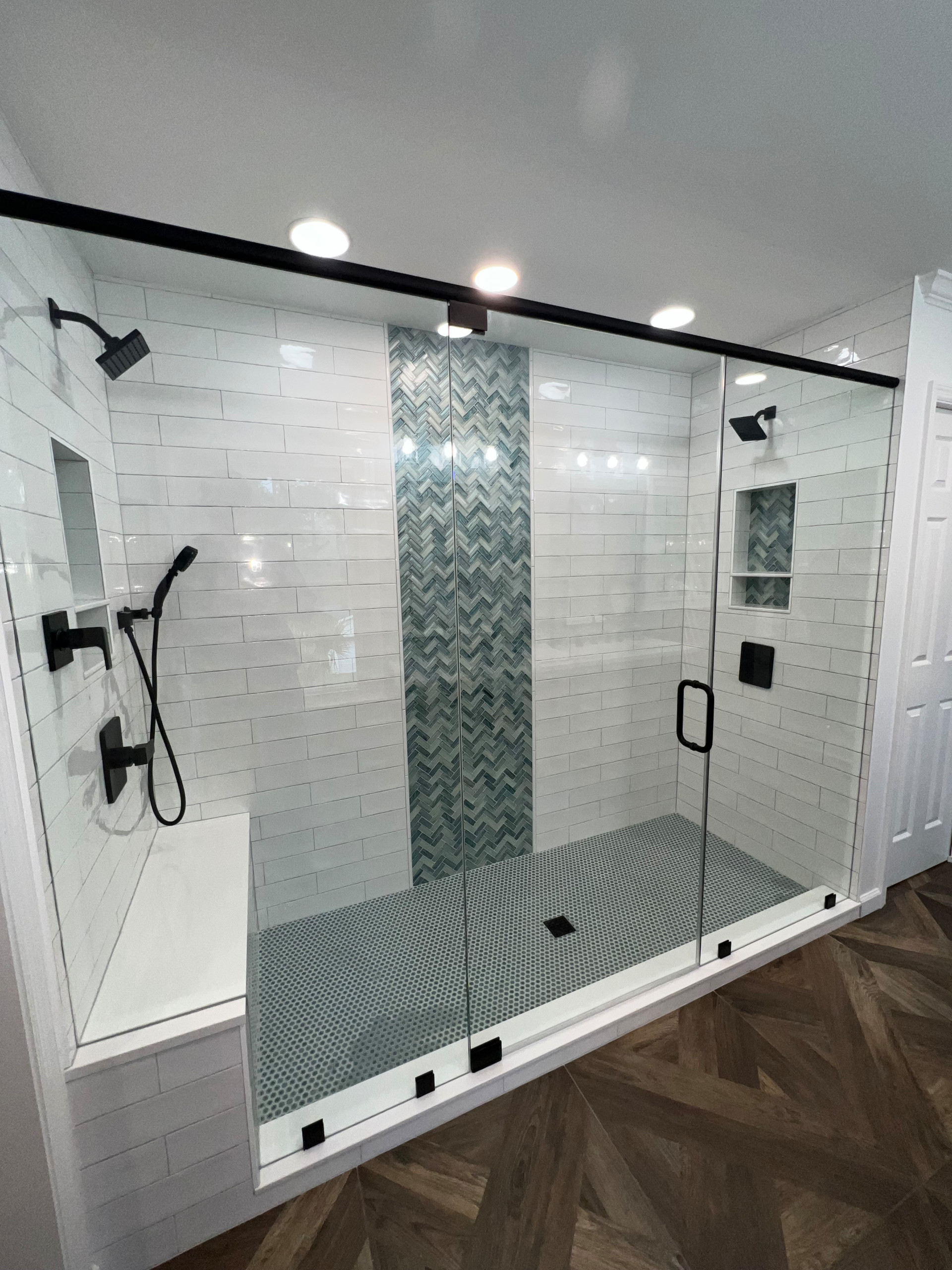 Walk in shower with custom stained vanity