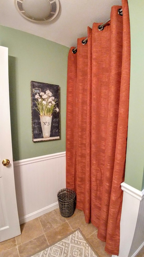 Example of a transitional home design design in Boston