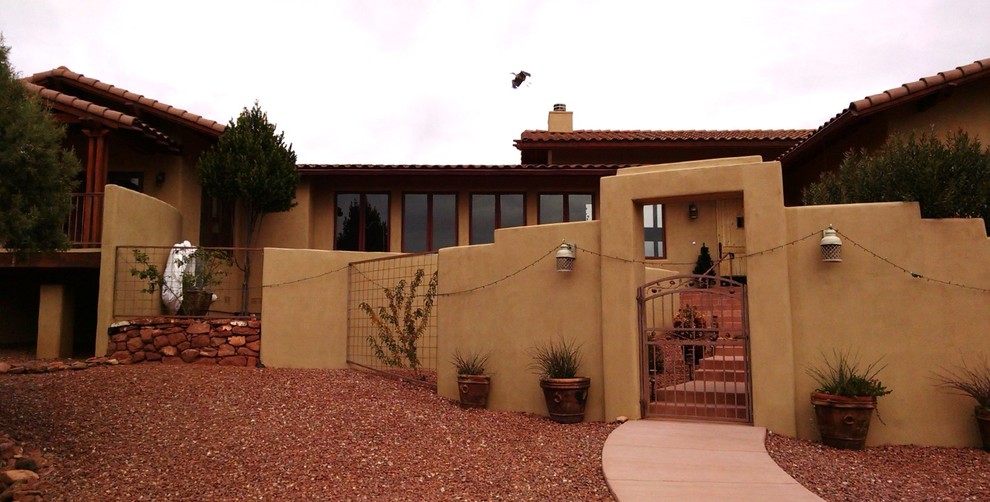 Photo of a stucco exterior in Phoenix with a hip roof.