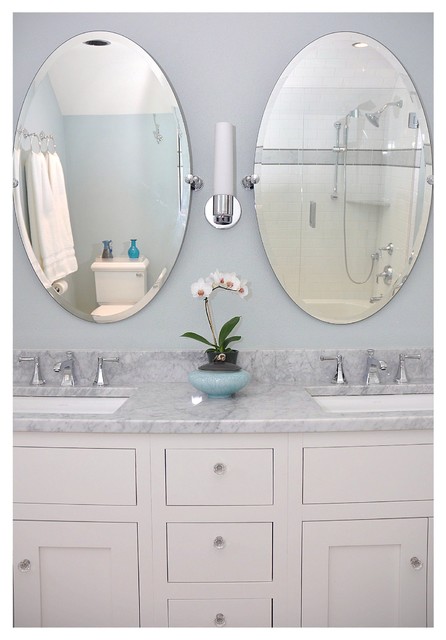  Double  sink  with oval mirrors  Traditional Bathroom  