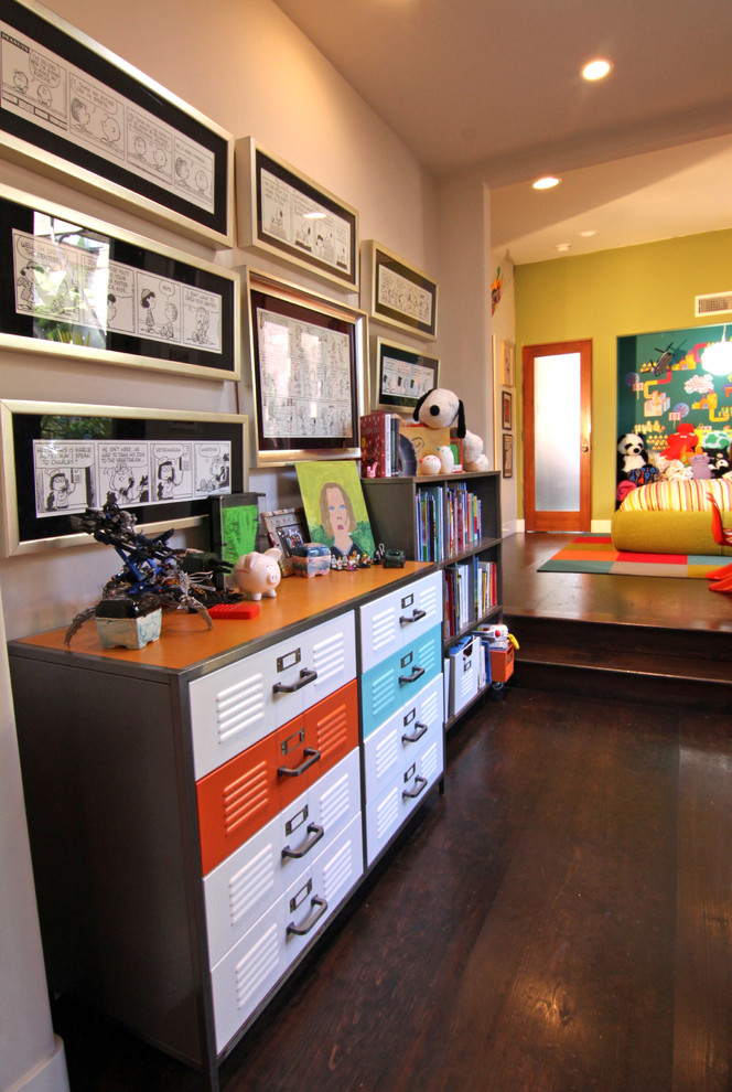 Inspiration for a contemporary kids' playroom for boys in Orange County with dark hardwood floors and multi-coloured walls.