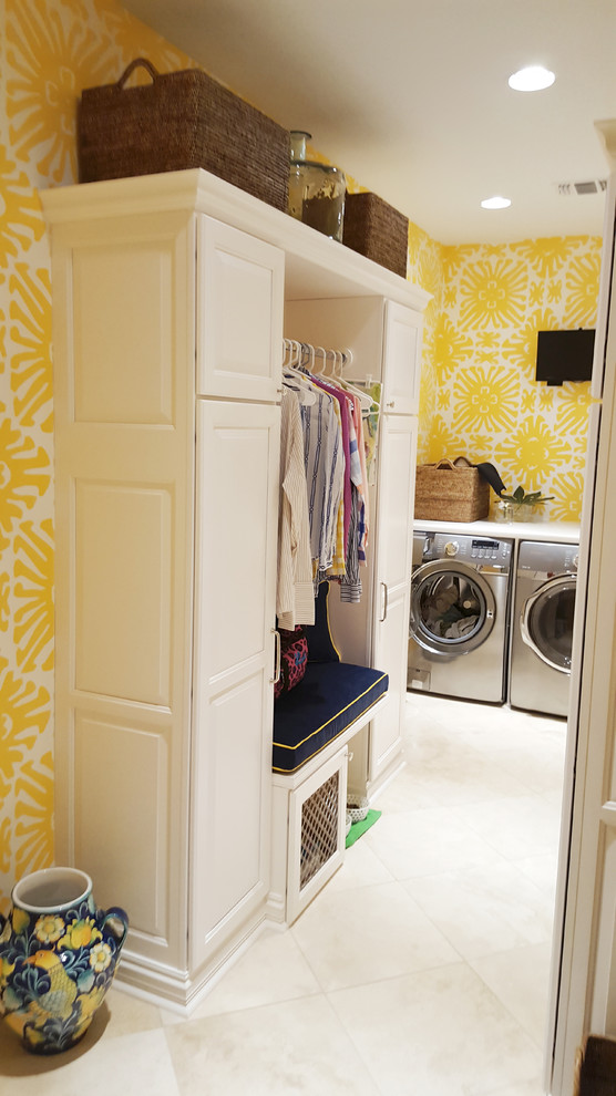 Design ideas for a small eclectic utility room in New Orleans with an undermount sink, raised-panel cabinets, white cabinets, yellow walls, ceramic floors and a side-by-side washer and dryer.