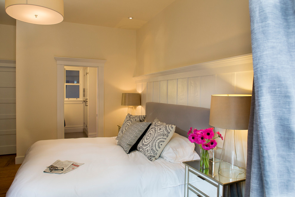 Mid-sized transitional master medium tone wood floor bedroom photo in San Francisco