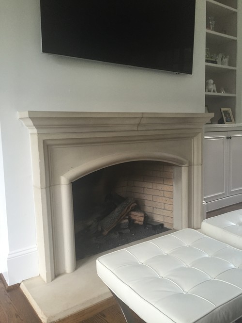 My cream dirty looking fire place does not match my white walls and trim now. Would you paint it?/ and if so how would you explain to the painters how to do it?