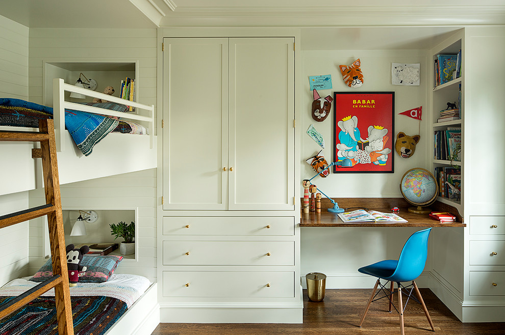 This is an example of a transitional kids' bedroom for boys in Portland with white walls, dark hardwood floors and brown floor.