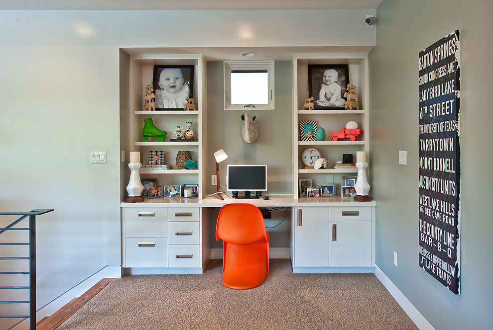 Inspiration for a contemporary gender-neutral kids' study room in Austin with grey walls and carpet.