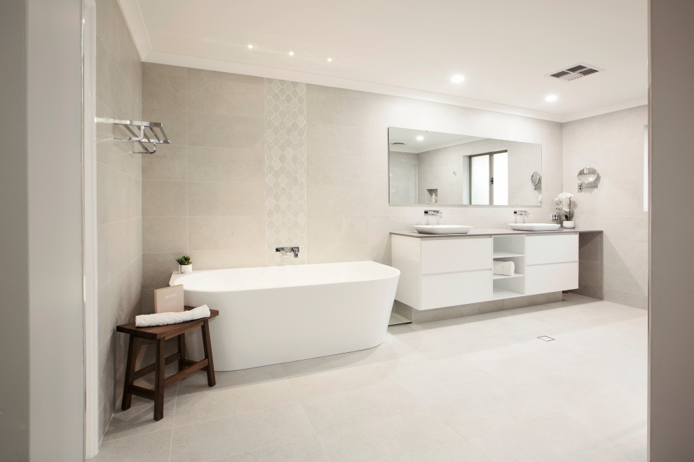 Photo of a large master bathroom in Perth with open cabinets, white cabinets, a freestanding tub, an alcove shower, a one-piece toilet, beige tile, beige walls, a vessel sink, beige floor, an open shower, beige benchtops, an enclosed toilet, a double vanity and a built-in vanity.
