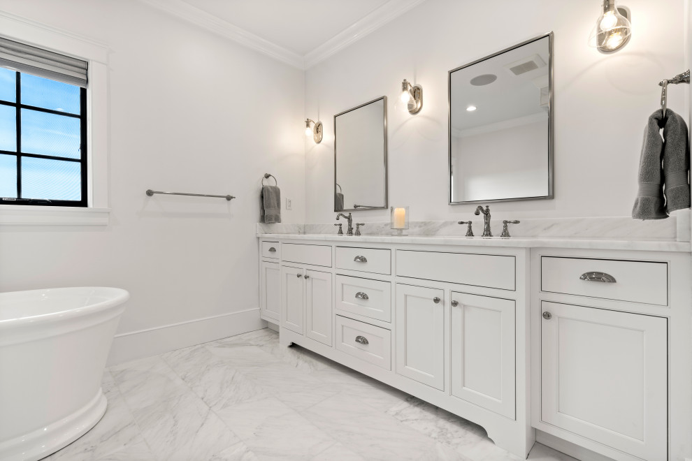 Freestanding bathtub - large transitional double-sink freestanding bathtub idea in Boston with shaker cabinets, white cabinets, an undermount sink and a built-in vanity