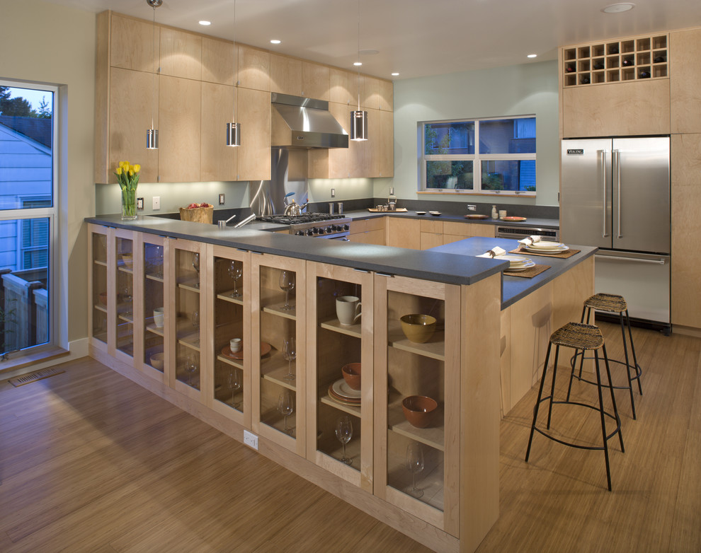 This is an example of a contemporary kitchen in Seattle with stainless steel appliances.