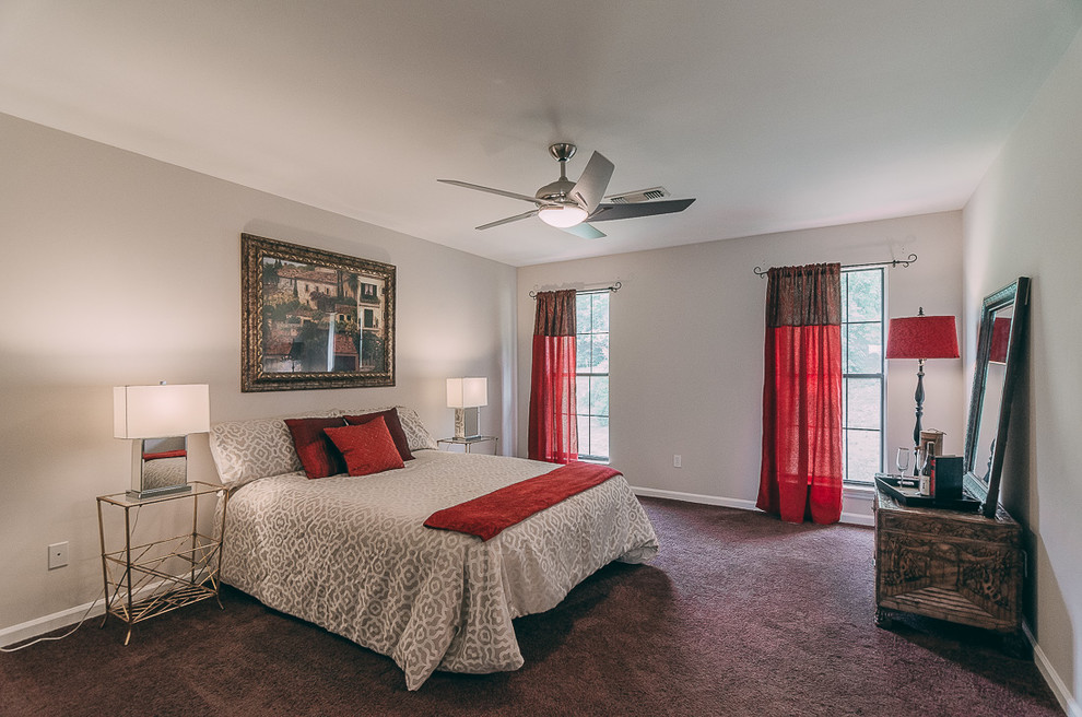 Mid-sized transitional guest bedroom in Nashville with beige walls, carpet, no fireplace and brown floor.