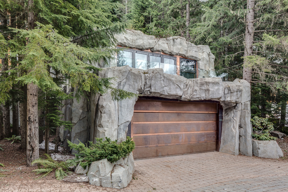 Garage - rustic two-car garage idea in Vancouver