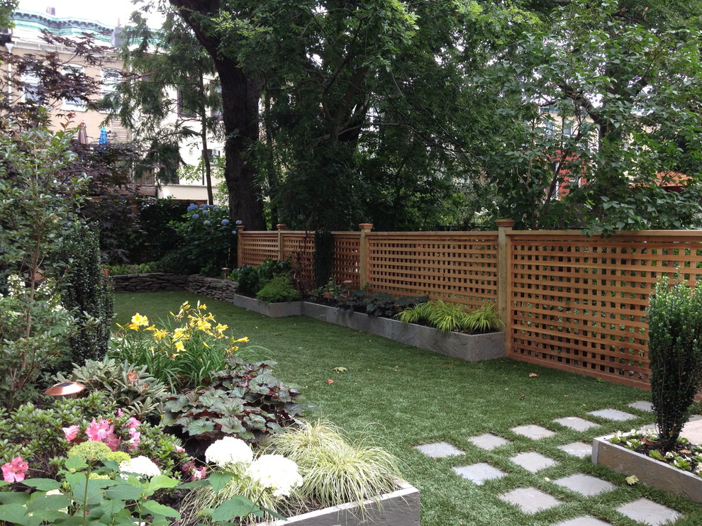 Synthetic Grass and Bluestone Raised Beds