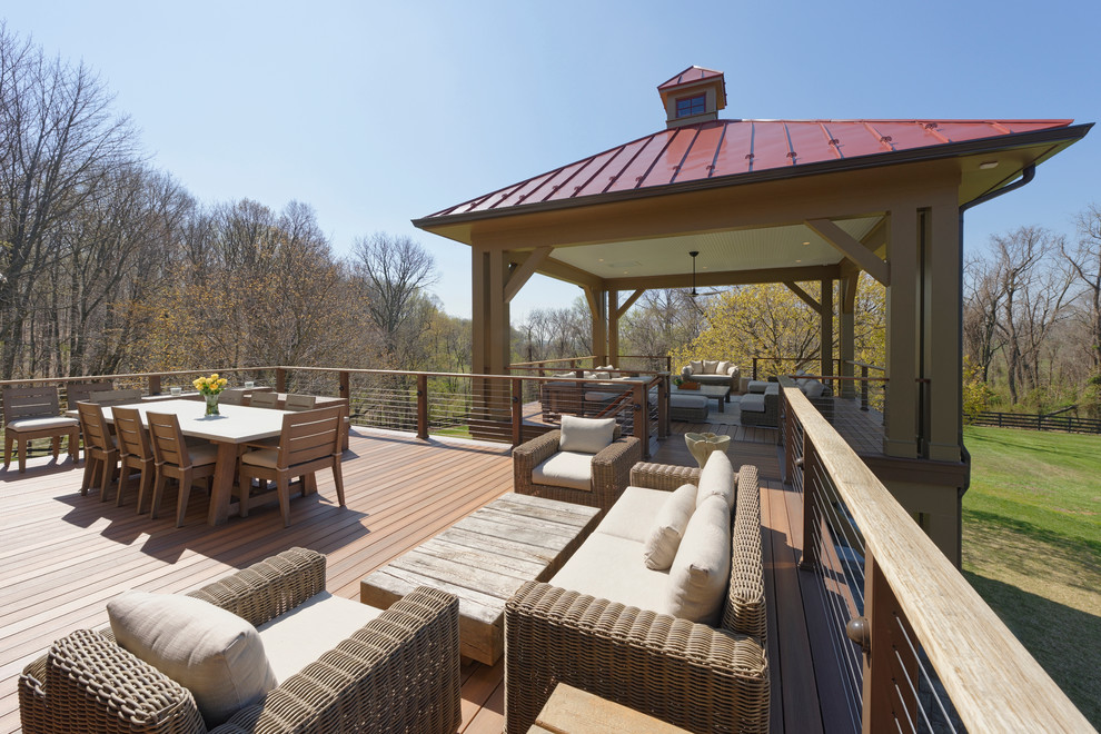 Inspiration for a large transitional side yard deck remodel in DC Metro with a pergola
