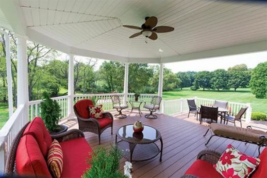 Inspiration for a large backyard deck remodel with an awning