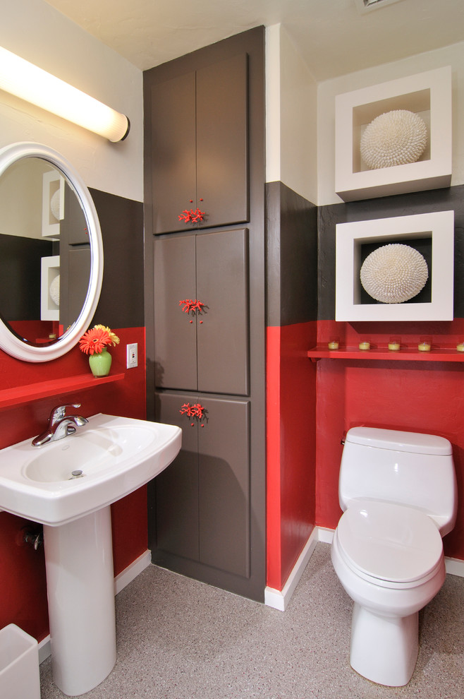 Inspiration for a mid-sized modern bathroom in Other with a pedestal sink, a two-piece toilet, multi-coloured walls, linoleum floors, a single vanity, a freestanding vanity and decorative wall panelling.
