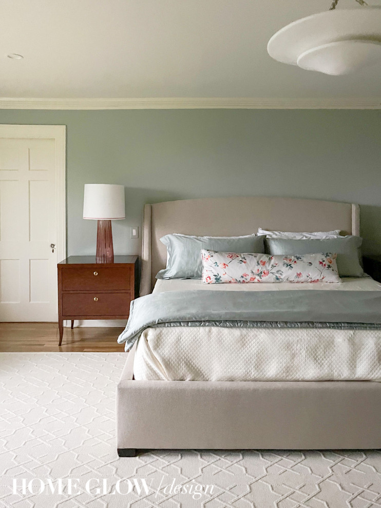This is an example of a mid-sized traditional master bedroom in Boston.