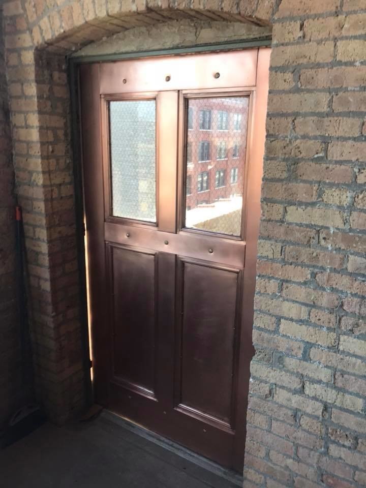 Example of a mid-sized mountain style backyard entryway design in Chicago