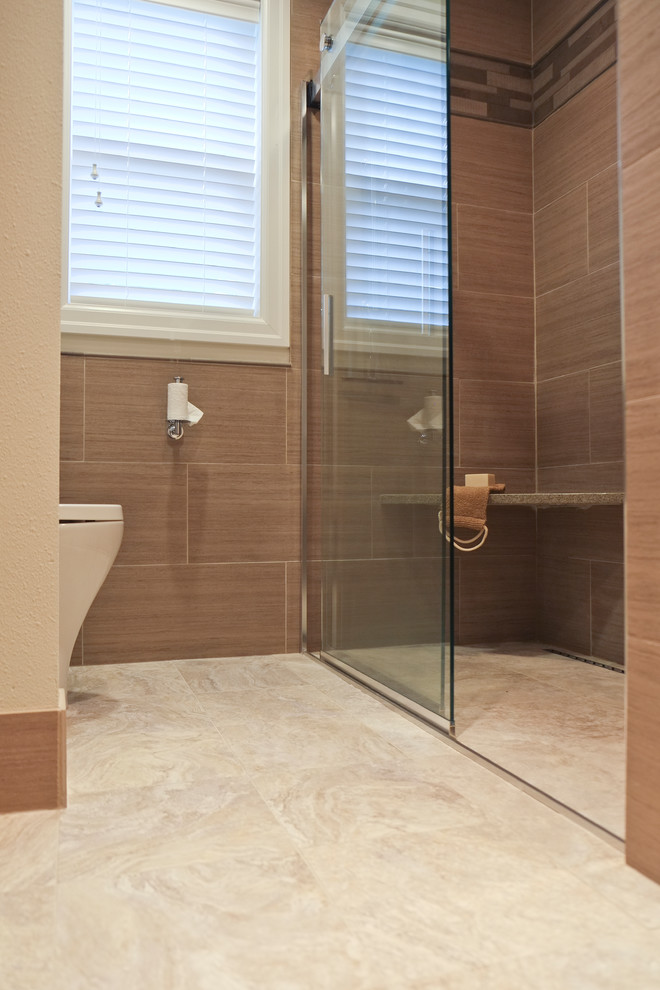 This is an example of a mid-sized contemporary master bathroom in Seattle with an undermount sink, flat-panel cabinets, medium wood cabinets, engineered quartz benchtops, an open shower, a one-piece toilet, brown tile, porcelain tile, porcelain floors and beige walls.