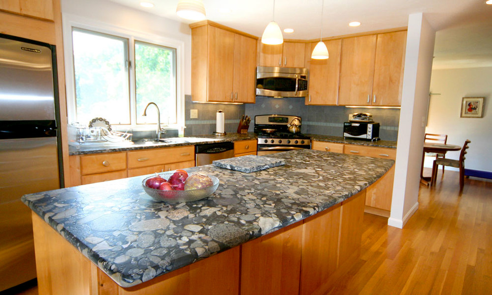 Kitchen pantry - mid-sized u-shaped medium tone wood floor kitchen pantry idea in Boston with an undermount sink, flat-panel cabinets, medium tone wood cabinets, granite countertops, gray backsplash, glass tile backsplash, stainless steel appliances and an island